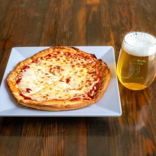 Gluten free pizza with cauliflower crust and melted cheese at Nature’s Edge Bistro, a restaurant in Saratoga Springs