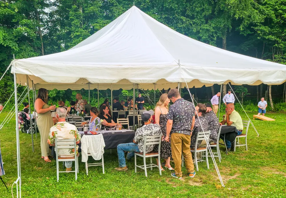 Outdoor private event under tent at Nature’s Edge Terrace at Artisanal Brew Works restaurant in Saratoga Springs