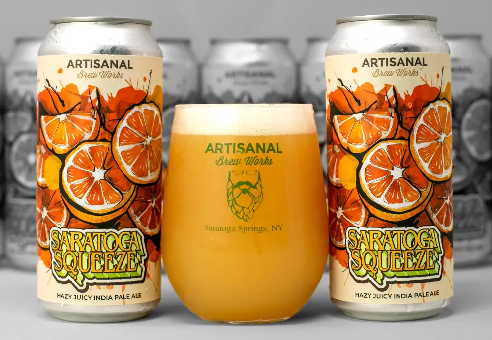 Hazy New England IPA Saratoga Squeeze with juicy citrus flavor in a glass at Artisanal Brew Works Brewery In Saratoga Springs