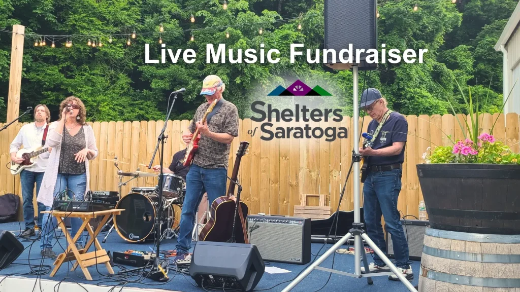 Live music fundraiser in Saratoga Springs at Artisanal Brew Works supporting Shelters of Saratoga with local musicians performing outdoors
