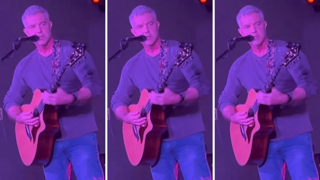 Jon A.J. Bright performing with acoustic guitar at Artisanal Brew Works in Saratoga Springs, NY